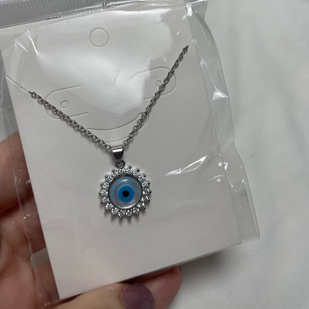New eye necklace.